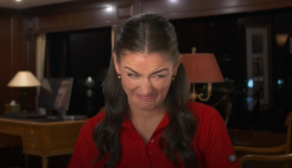 Aesha Scott red shirt grimacing Below Deck Mediterranean