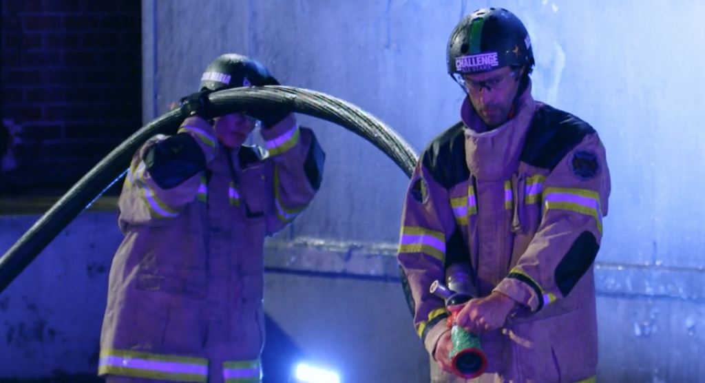 Cara Maria Sorbello and Ace Amerson in fire fighter outfits